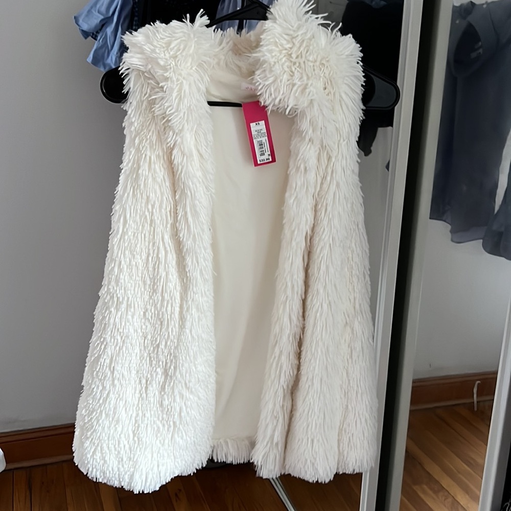 XS fluffy vest, brand new with tag. Xhilaration